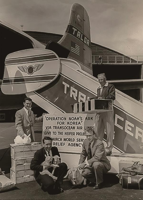 This photo, provided by Heifer Internatio<em></em>nal Korea on Dec. 22, 2022, shows organization officials pose for a photo in April, 1954, in California, with goats, rabbits and other animals before sending them to South Korea. (PHOTO NOT FOR SALE) (Yonhap)
