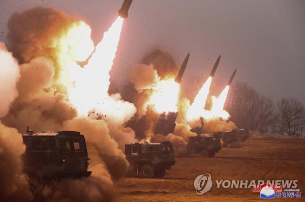 This photo, released by North Korea's official Korean Central News Agency on March 10, 2023, shows what appears to be tactical guided missiles being launched the previous day. North Korean leader Kim Jong-un inspected the 