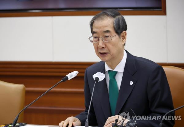 Prime Minister Han Duck-soo presides over a coordination meeting with related ministers to discuss key state affairs at the government complex in Seoul on March 23, 2023. (Yonhap)