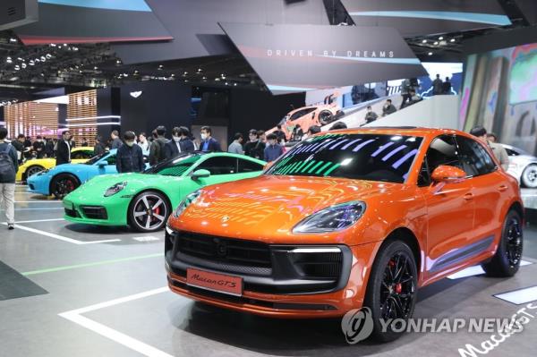 Porsche models are displayed at the Seoul Mobility Show at the KINTEX exhibition hall in Goyang, just northwest of Seoul, on March 31, 2023. The show runs through April 9. (Yonhap)
