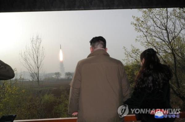 This photo, released by the North's official Korean Central News Agency on April 14, 2023, shows North Korean leader Kim Jong-un watching the launch of the Hwasong-18 interco<em></em>ntinental ballistic missile the previous day. (For Use o<em></em>nly in the Republic of Korea. No Redistribution) (Yonhap)
