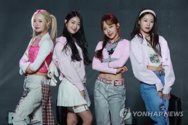 Rookie girl group Fifty Fifty poses for photos during a news co<em></em>nference at an art hall in Seoul, in this April 13, 2023, file photo. (Yonhap)