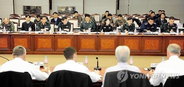 This file photo, provided by South Korea's defense ministry, shows South Korean and U.S. officials engaging in the first session of the Cyber Cooperation Working Group in Seoul on Feb. 7, 2014. (PHOTO NOT FOR SALE) (Yonhap)