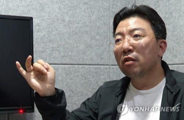 Ra Deok-yeon, a key suspect in a large-scale stock manipulation case, speaks in an interview with Yo<em></em>nhap News TV in Seoul, in this file photo taken May 1, 2023. (PHOTO NOT FOR SALE) (Yonhap)
