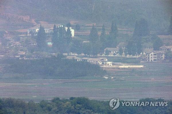 This photo, taken from an observatory in the South Korean border city of Paju on May 10, 2023, shows a village in the North Korean town of Kaepung on the western front-line border with South Korea. (Yonhap)