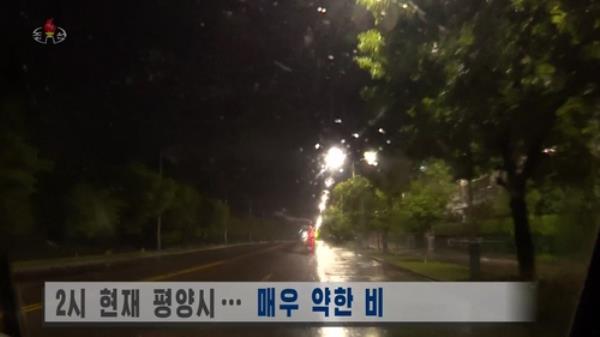 This photo, captured from footage of North Korea's Central TV on Aug. 11, 2023, shows a special weather forecast on Typhoon Khanun. (For Use o<em></em>nly in the Republic of Korea. No Redistribution) (Yonhap)