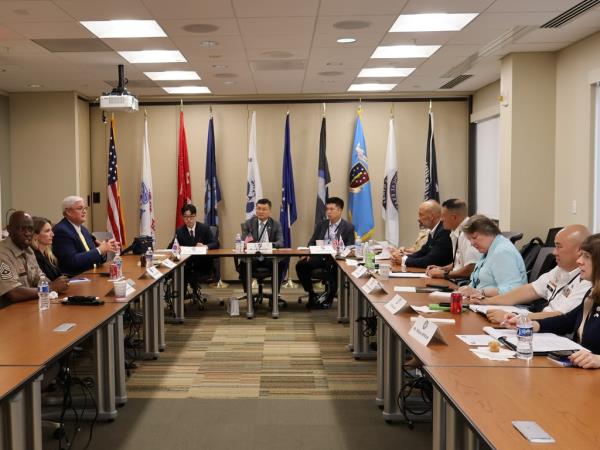Officials from the South Korean defense ministry's Agency for KIA Recovery and Identification and the Pentagon's Defense POW/MIA Accounting Agency meet at Dover Air Force ba<em></em>se in Delaware on Aug. 15, 2023, in this photo released by the ministry. (PHOTO NOT FOR SALE) (Yonhap)