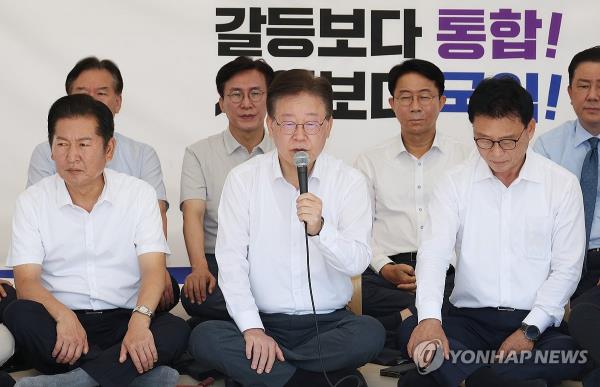 The leader of the main opposition Democratic Party (DP) Lee Jae-myung speaks under a tent as he co<em></em>ntinues his sit-in hunger strike against the government on Sept. 1, 2023. (Yonhap)
