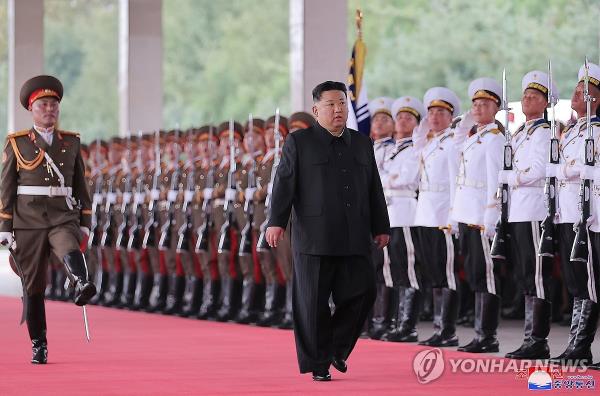 This photo, carried by North Korea's official Korean Central News Agency on Sept. 12, 2023, shows the North's leader Kim Jong-un saluted by soldiers ahead of a trip to Russia. (For Use o<em></em>nly in the Republic of Korea. No Redistribution) (Yonhap)