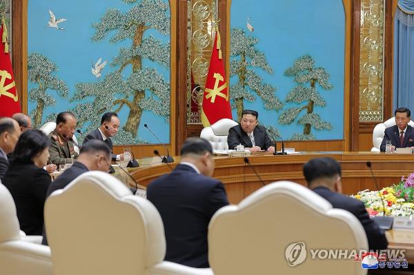This photo, carried by North Korea's official Korean Central News Agency on Sept. 22, 2023, shows North Korean leader Kim Jong-un (C) presiding over a politburo meeting of the Central Committee of the ruling Workers' Party of Korea to discuss the outcome of his latest summit with Russian President Vladimir Putin. (For Use o<em></em>nly in the Republic of Korea. No Redistribution) (Yonhap)