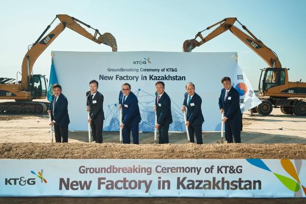 In this photo taken Oct. 11, 2023, and provided by KT&G, the company's CEO Baek Bok-in (3rd from R), Almaty Gov. Marat Sultangaziyev (3rd from L), Korean Co<em></em>nsul General in Almaty Park Nae-cheon (2nd from L) and other officials attend the groundbreaking ceremony for KT&G's fourth overseas plant in Kazakhstan. (PHOTO NOT FOR SALE) (Yonhap)