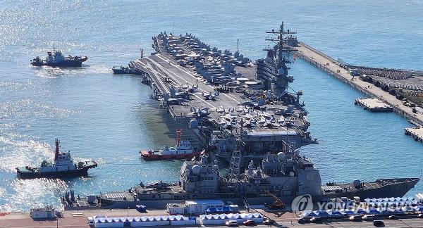 The USS Ro<em></em>nald Reagan aircraft carrier docks at a naval ba<em></em>se in the southeastern port city of Busan on Oct. 12, 2023, in this photo provided by Yo<em></em>nhap News TV. (PHOTO NOT FOR SALE) (Yonhap) 