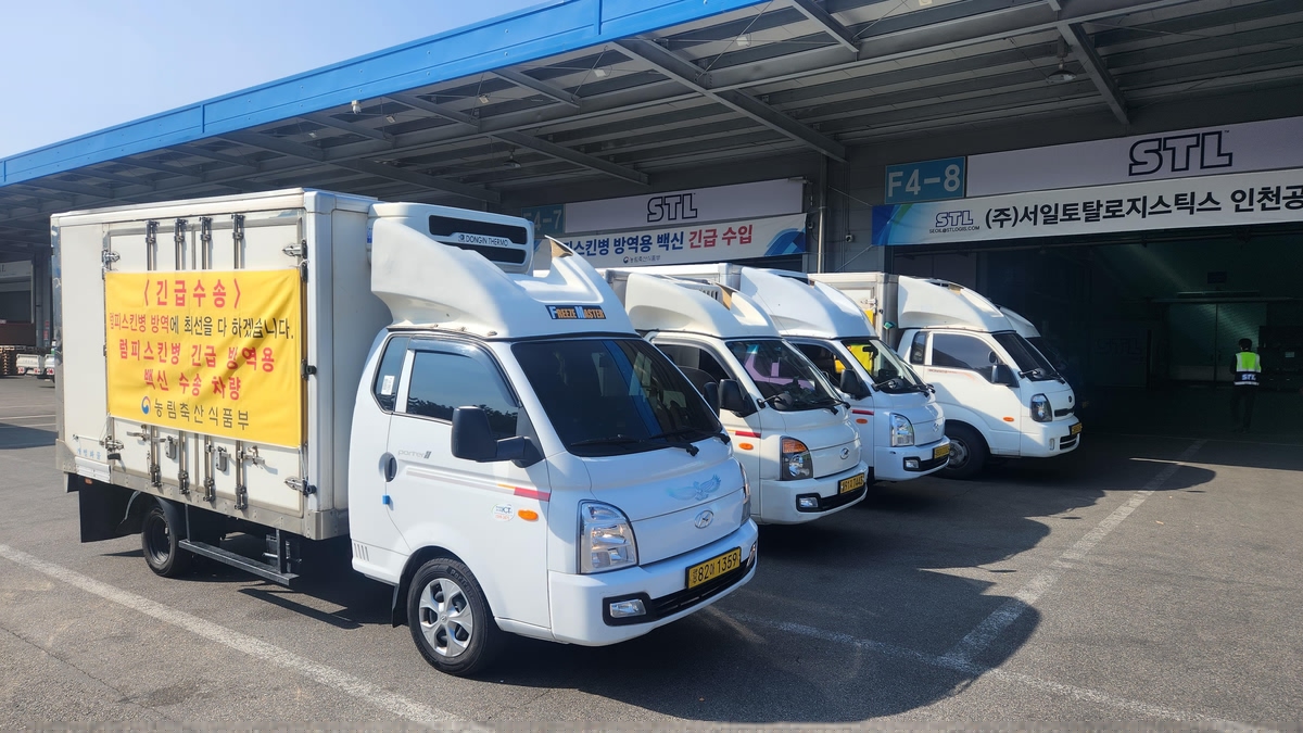 This photo provided by the Ministry of Agriculture, Food and Rural Affairs shows trucks carrying lumpy skin disease vaccine shots in Incheon, west of Seoul, on Oct. 28, 2023. (PHOTO NOT FOR SALE) (Yonhap)