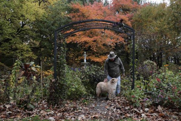Possibility Place Nursery's founder Co<em></em>nnor Shaw walks around the property with his dog, Remy. Shaw is semiretired but still comes out to co<em></em>nnect with their customers. 