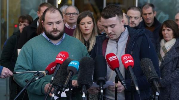 (L-R) Ms Murphy's brother Cathal, sister Amy and her boyfriend Ryan Casey speak to the media outside court