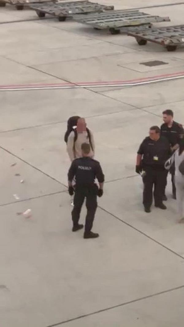 Notes were seen blowing across the runway