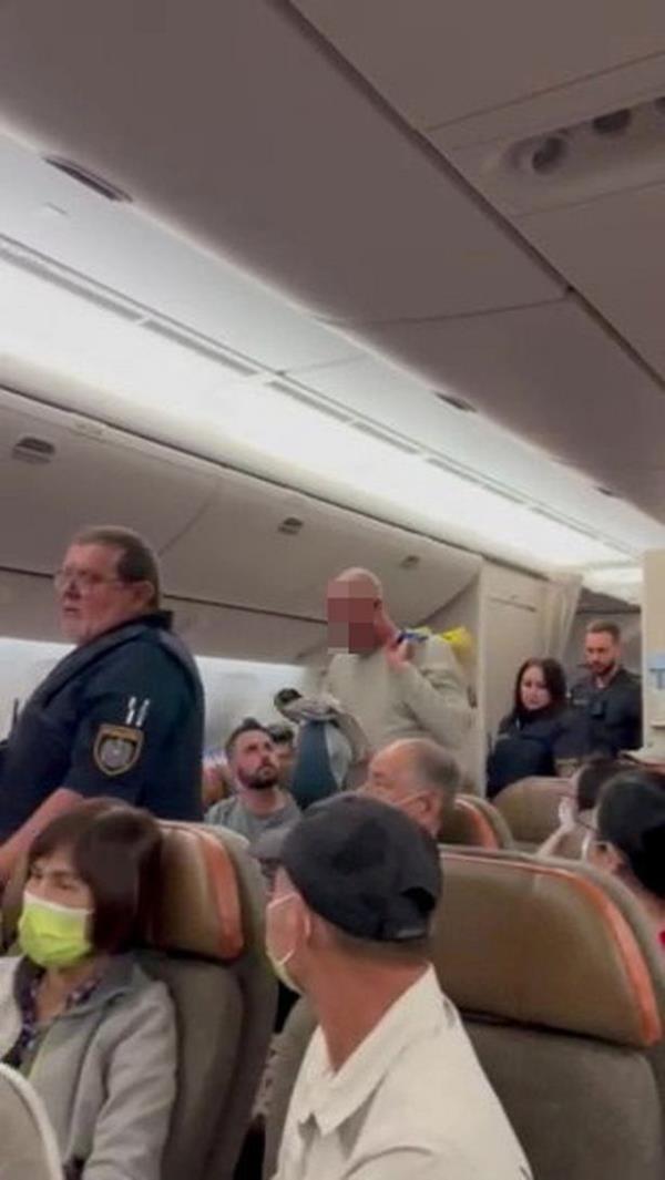 Mr Singh captured footage of the couple being taken from the plane