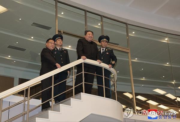 North Korean leader Kim Jong-un (2nd from R) visits the Pyo<em></em>ngyang General Co<em></em>ntrol Center of the North's Natio<em></em>nal Aerospace Technology Administration on Nov. 22, 2023, in this photo carried by the Korean Central News Agency. (For Use o<em></em>nly in the Republic of Korea. No Redistribution) (Yonhap)