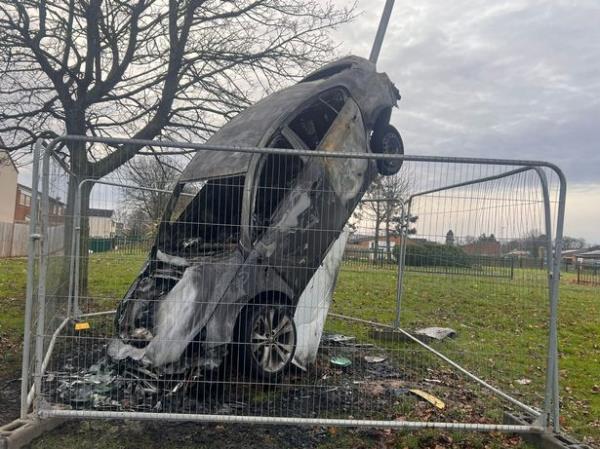 The burnt out car has now been fenced off