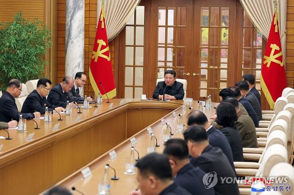 North Korean leader Kim Jong-un (5th from L) holds a politburo meeting of the Workers' Party Central Committee with his top officials in Pyongyang, on Dec. 1, 2023, in this photo released the following day by the Korean Central News Agency. (For Use o<em></em>nly in the Republic of Korea. No Redistribution) (Yonhap) 