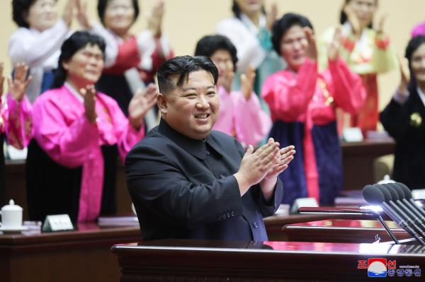 This photo, on Monday, shows the North's leader Kim Jong-un attending the Fifth Natio<em></em>nal Meeting of Mothers held the previous day in Pyongyang. (Yonhap)