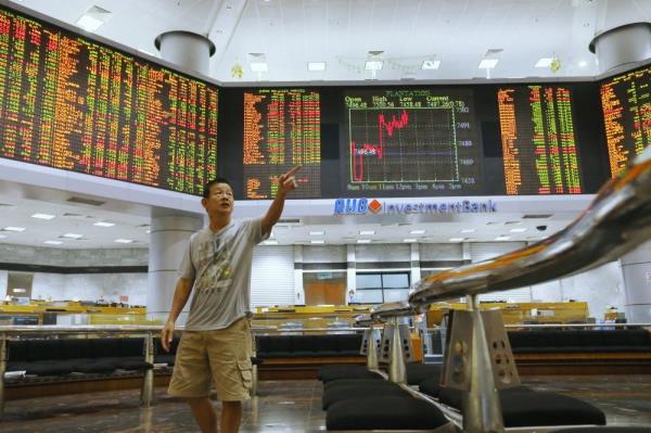 Bursa Malaysia remains flat at mid-afternoon