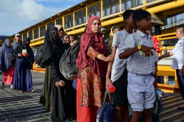 More Rohingya take children as they leave Bangladesh by boat, say aid groups